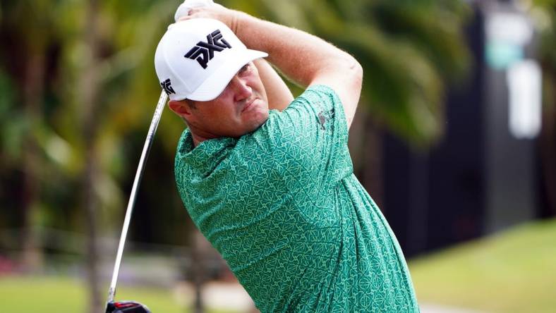 Oct 30, 2022; Miami, Florida, USA; Jason Kokrak plays his shot from the seventh tee  during the final round of the season finale of the LIV Golf series at Trump National Doral. Mandatory Credit: John David Mercer-USA TODAY Sports