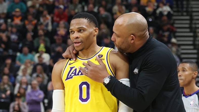 Nov 7, 2022; Salt Lake City, Utah, USA; Los Angeles Lakers head coach Darvin Ham speaks with guard Russell Westbrook (0) against the Utah Jazz in the second quarter at Vivint Arena. Mandatory Credit: Rob Gray-USA TODAY Sports