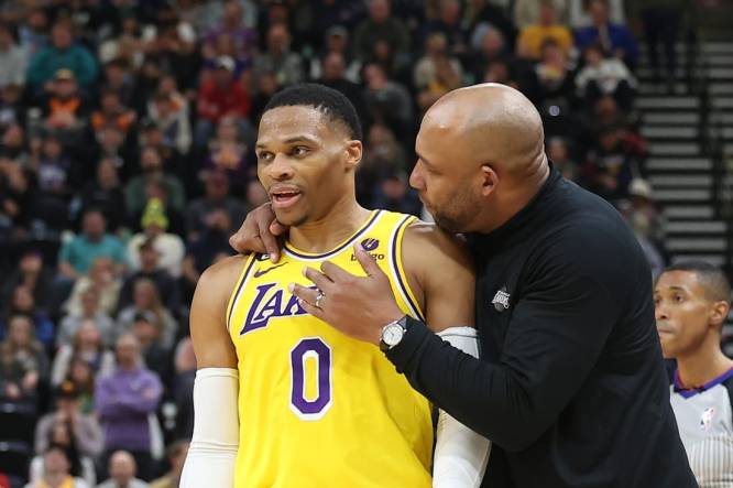 Nov 7, 2022; Salt Lake City, Utah, USA; Los Angeles Lakers head coach Darvin Ham speaks with guard Russell Westbrook (0) against the Utah Jazz in the second quarter at Vivint Arena. Mandatory Credit: Rob Gray-USA TODAY Sports