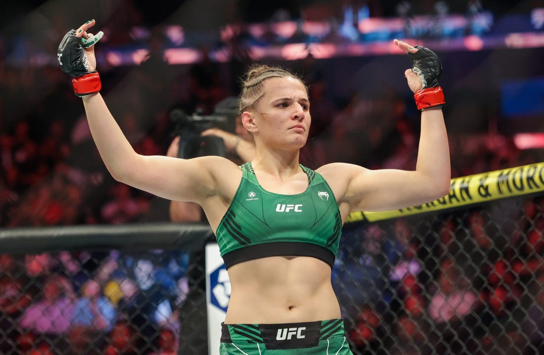 Nov 12, 2022; New York, NY, USA; Erin Blanchfield (red gloves) defeats Molly McCann (blue gloves) during UFC 281 at Madison Square Garden. Mandatory Credit: Jessica Alcheh-USA TODAY Sports