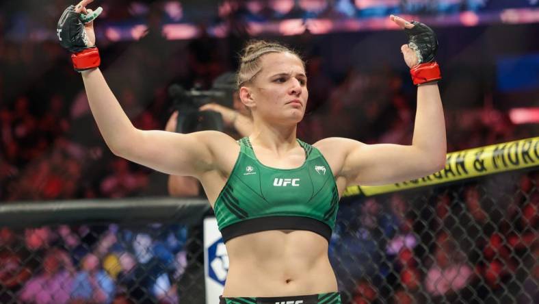 Nov 12, 2022; New York, NY, USA; Erin Blanchfield (red gloves) defeats Molly McCann (blue gloves) during UFC 281 at Madison Square Garden. Mandatory Credit: Jessica Alcheh-USA TODAY Sports