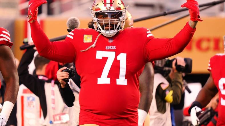 Nov 13, 2022; Santa Clara, California, USA; San Francisco 49ers offensive tackle Trent Williams (71) gestures toward fans before a game against the Los Angeles Chargers at Levi's Stadium. Mandatory Credit: Kelley L Cox-USA TODAY Sports