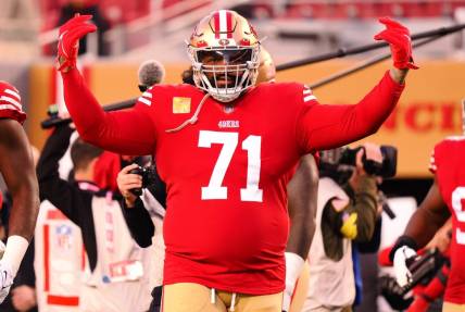 Nov 13, 2022; Santa Clara, California, USA; San Francisco 49ers offensive tackle Trent Williams (71) gestures toward fans before a game against the Los Angeles Chargers at Levi's Stadium. Mandatory Credit: Kelley L Cox-USA TODAY Sports