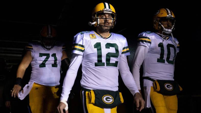 Nov 27, 2022; Philadelphia, Pennsylvania, USA; Green Bay Packers quarterback Aaron Rodgers (12) and quarterback Jordan Love (10) lead their team out of the tunnel before action Philadelphia Eagles at Lincoln Financial Field. Mandatory Credit: Bill Streicher-USA TODAY Sports