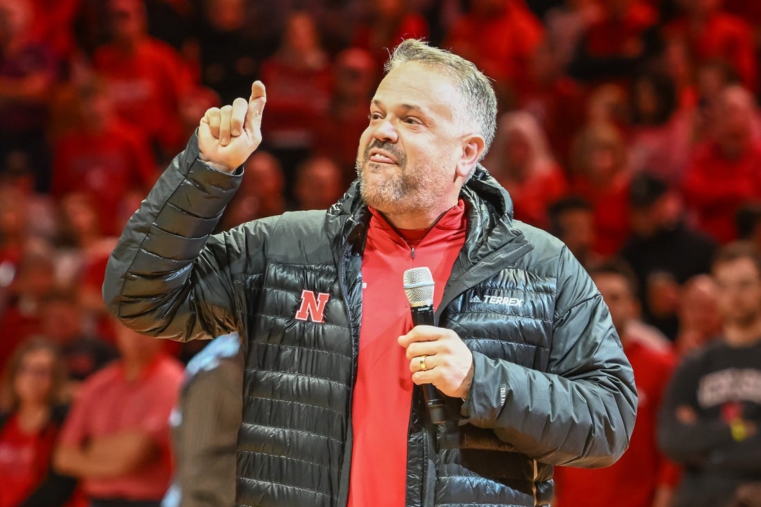 Dec 10, 2022; Lincoln, Nebraska, USA;  Nebraska Cornhuskers head football coach Matt Rhule talks to the crowd during halftime of the game against the Purdue Boilermakers in the first half at Pinnacle Bank Arena. Mandatory Credit: Steven Branscombe-USA TODAY Sports