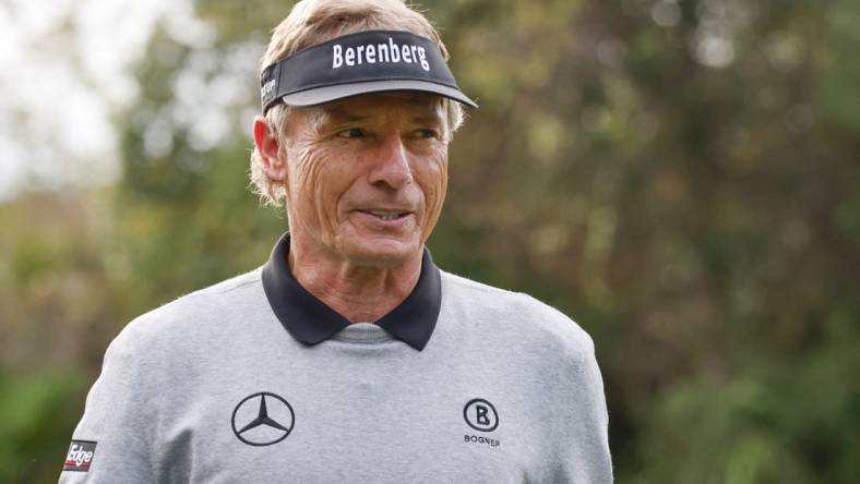 Dec 16, 2022; Orlando, Florida, USA; Bernhard Langer walks off of the ninth green during a pro-am round of the PNC Championship golf tournament at Ritz Carlton Golf Club Grande Lakes Orlando Course. Mandatory Credit: Reinhold Matay-USA TODAY Sports