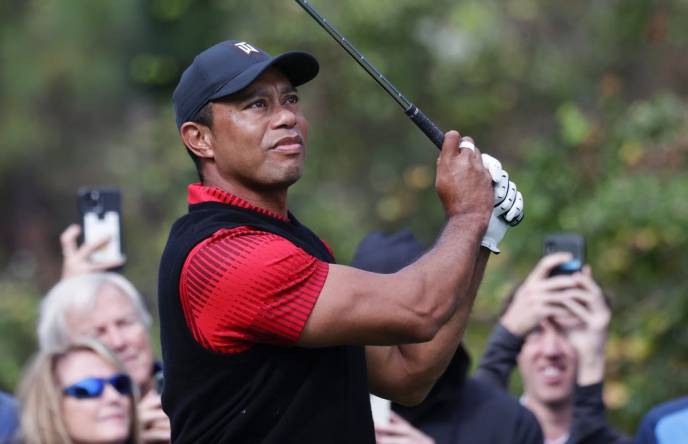Dec 18, 2022; Orlando, Florida, USA; Tiger Woods watches his drive on the third hole during the final round of the PNC Championship golf tournament at Ritz Carlton Golf Club Grande Lakes Orlando Course. Mandatory Credit: Reinhold Matay-USA TODAY Sports