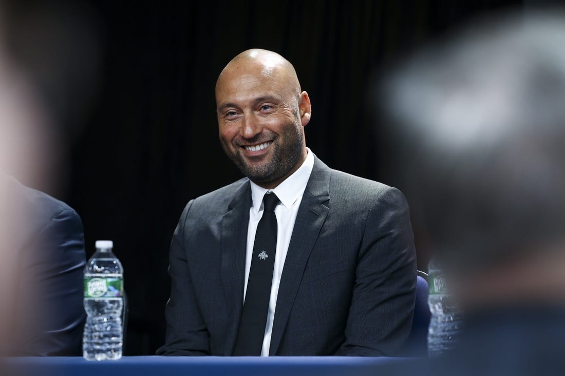 Dec 21, 2022; Bronx, New York, USA; Derek Jeter reacts during a press conference at Yankee Stadium. Mandatory Credit: Jessica Alcheh-USA TODAY Sports