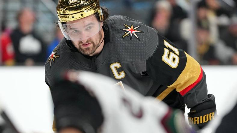 Dec 21, 2022; Las Vegas, Nevada, USA; Vegas Golden Knights right wing Mark Stone (61) awaits a face off against the Arizona Coyotes during the second period at T-Mobile Arena. Mandatory Credit: Stephen R. Sylvanie-USA TODAY Sports