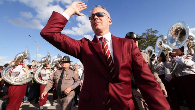 Dec 29, 2022; Orlando, Florida, USA; Florida State Seminoles head coach Mike Norvell arrives for a game against the Oklahoma Sooners in the 2022 Cheez-It Bowl at Camping World Stadium. Mandatory Credit: Nathan Ray Seebeck-USA TODAY Sports