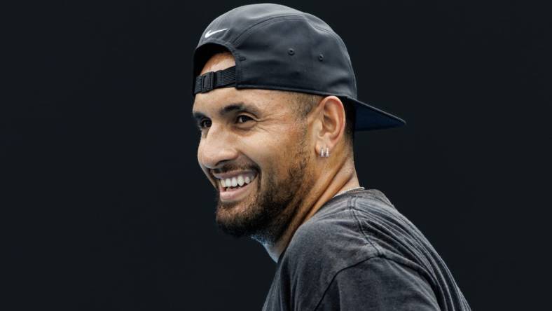 Jan 15, 2023; Melbourne, Victoria, Australia; Nick Kyrgios of Australia laughs during a practice session on court 16 at Melbourne Park. Mandatory Credit: Mike Frey-USA TODAY Sports