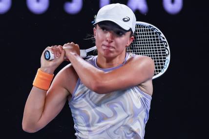 Jan 18, 2023; Melbourne, Victoria, Australia; Iga Swiatek during her second round match against Camila Osorio on day three of the 2023 Australian Open tennis tournament at Melbourne Park. Mandatory Credit: Mike Frey-USA TODAY Sports