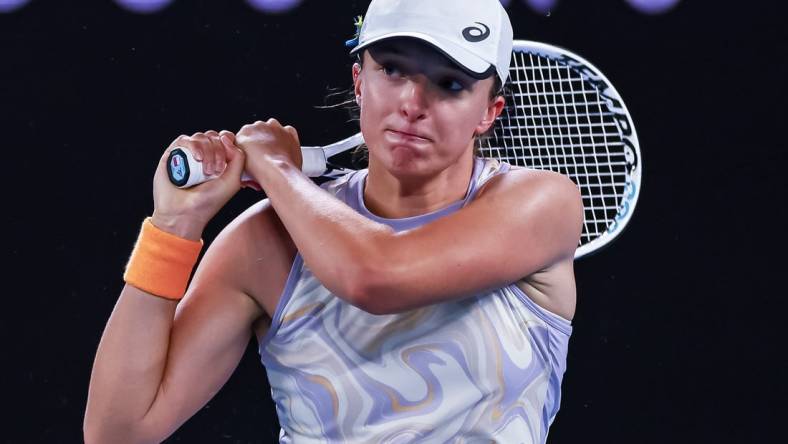 Jan 18, 2023; Melbourne, Victoria, Australia; Iga Swiatek during her second round match against Camila Osorio on day three of the 2023 Australian Open tennis tournament at Melbourne Park. Mandatory Credit: Mike Frey-USA TODAY Sports