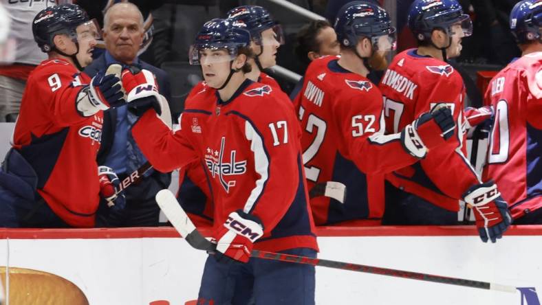 Jan 17, 2023; Washington, District of Columbia, USA; Washington Capitals center Dylan Strome (17) celebrates with teammates after scoring a goal against the Minnesota Wild in the second period at Capital One Arena. Mandatory Credit: Geoff Burke-USA TODAY Sports