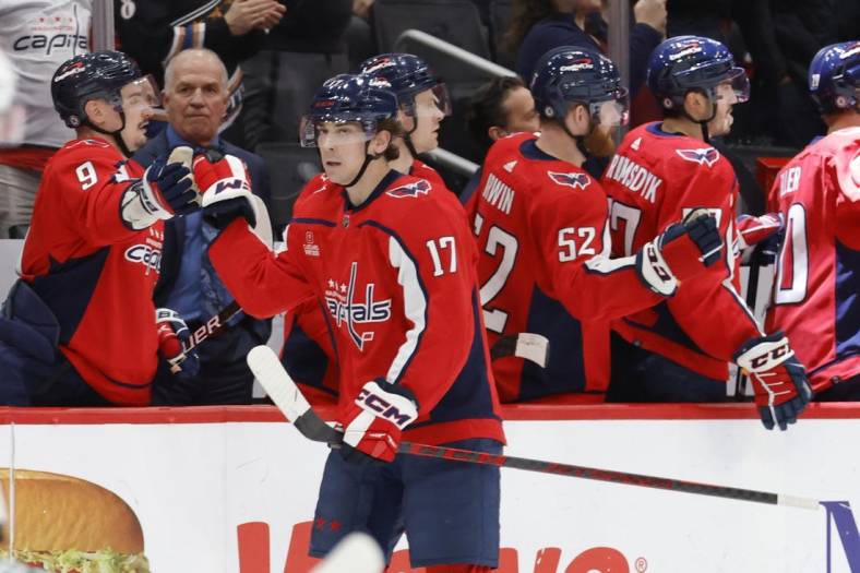 Jan 17, 2023; Washington, District of Columbia, USA; Washington Capitals center Dylan Strome (17) celebrates with teammates after scoring a goal against the Minnesota Wild in the second period at Capital One Arena. Mandatory Credit: Geoff Burke-USA TODAY Sports