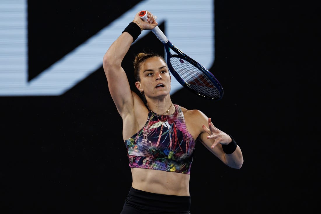 Jan 20, 2023; Melbourne, Victoria, Australia; Maria Sakkari of Greece hits a shot against  Zhu Lin of China on day five of the 2023 Australian Open tennis tournament at Melbourne Park. Mandatory Credit: Mike Frey-USA TODAY Sports