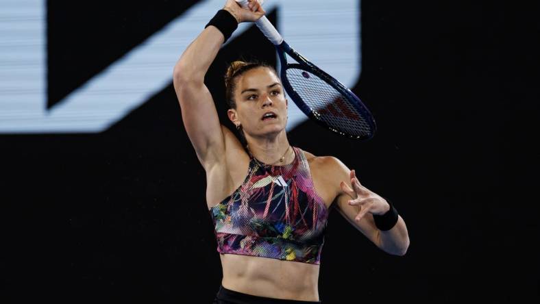 Jan 20, 2023; Melbourne, Victoria, Australia; Maria Sakkari of Greece hits a shot against  Zhu Lin of China on day five of the 2023 Australian Open tennis tournament at Melbourne Park. Mandatory Credit: Mike Frey-USA TODAY Sports