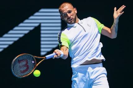 Jan 21, 2023; Melbourne, VICTORIA, Australia; Daniel Evans from Great Britain during his third round match against Andrey Rublev from Russia on day six of the 2023 Australian Open tennis tournament at Melbourne Park. Mandatory Credit: Mike Frey-USA TODAY Sports