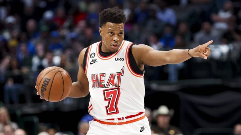 Jan 20, 2023; Dallas, Texas, USA;  Miami Heat guard Kyle Lowry (7) controls the ball during the first half against the Dallas Mavericks at American Airlines Center. Mandatory Credit: Kevin Jairaj-USA TODAY Sports