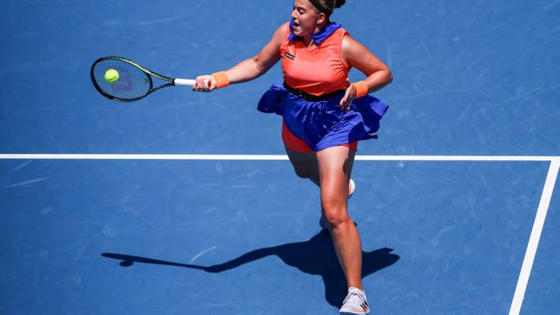 Jan 22, 2023; Melbourne, VICTORIA, Australia; Jelena Ostapenko from Latvia during her fourth round match against Coco Gauff from the United States on day seven of the 2023 Australian Open tennis tournament at Melbourne Park. Mandatory Credit: Mike Frey-USA TODAY Sports