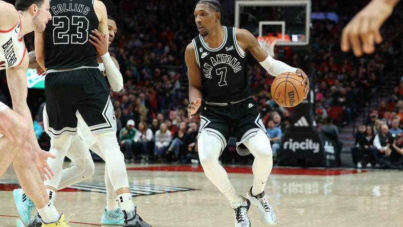 Jan 23, 2023; Portland, Oregon, USA; San Antonio Spurs guard Josh Richardson (7) dribbles the ball against the Portland Trail Blazers in the second half at Moda Center. Mandatory Credit: Jaime Valdez-USA TODAY Sports