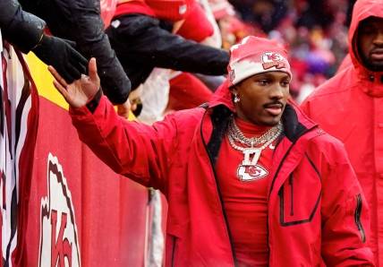 Jan 21, 2023; Kansas City, Missouri, USA; Kansas City Chiefs wide receiver Mecole Hardman (17) greets fans prior to an AFC divisional round game against the Jacksonville Jaguars at GEHA Field at Arrowhead Stadium. Mandatory Credit: Jay Biggerstaff-USA TODAY Sports