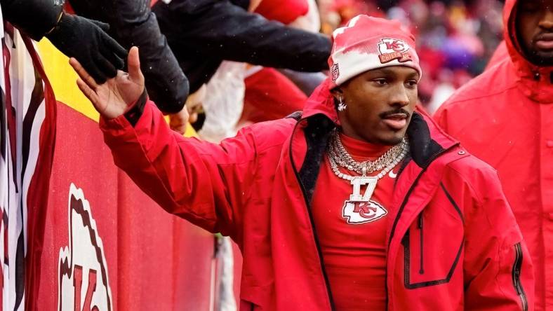 Jan 21, 2023; Kansas City, Missouri, USA; Kansas City Chiefs wide receiver Mecole Hardman (17) greets fans prior to an AFC divisional round game against the Jacksonville Jaguars at GEHA Field at Arrowhead Stadium. Mandatory Credit: Jay Biggerstaff-USA TODAY Sports