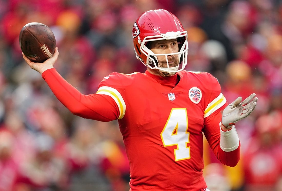 Jan 21, 2023; Kansas City, Missouri, USA; Kansas City Chiefs quarterback Chad Henne (4) throws a pass during the first half of an AFC divisional round game against the Jacksonville Jaguars at GEHA Field at Arrowhead Stadium. Mandatory Credit: Jay Biggerstaff-USA TODAY Sports