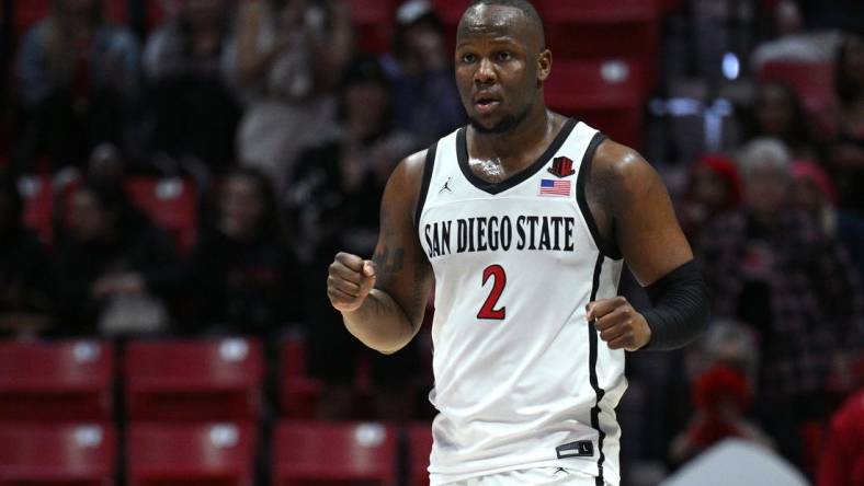 Jan 25, 2023; San Diego, California, USA; San Diego State Aztecs guard Adam Seiko (2) celebrates on the court after defeating the Utah State Aggies at Viejas Arena. Mandatory Credit: Orlando Ramirez-USA TODAY Sports