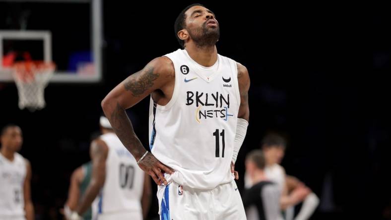 Jan 26, 2023; Brooklyn, New York, USA; Brooklyn Nets guard Kyrie Irving (11) reacts after during the fourth quarter against the Detroit Pistons at Barclays Center. Mandatory Credit: Brad Penner-USA TODAY Sports