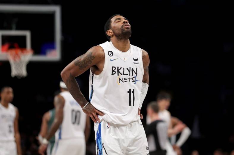 Jan 26, 2023; Brooklyn, New York, USA; Brooklyn Nets guard Kyrie Irving (11) reacts after during the fourth quarter against the Detroit Pistons at Barclays Center. Mandatory Credit: Brad Penner-USA TODAY Sports