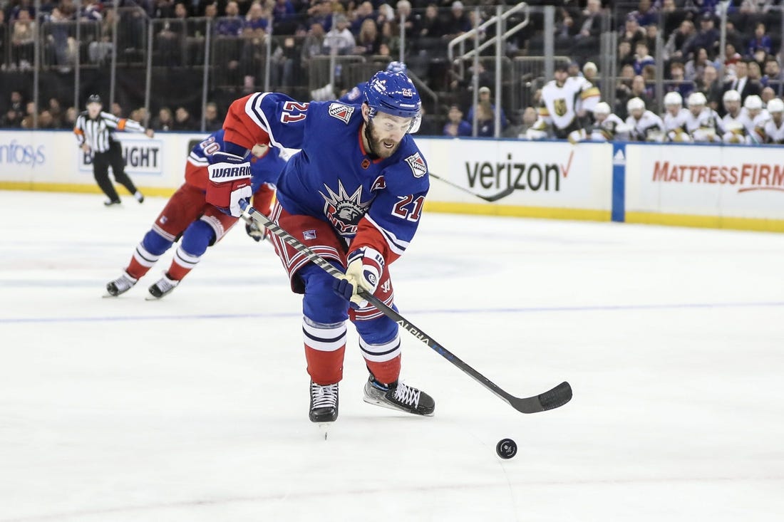 Jan 27, 2023; New York, New York, USA;  New York Rangers center Barclay Goodrow (21) chases the puck in the second period against the Vegas Golden Knights at Madison Square Garden. Mandatory Credit: Wendell Cruz-USA TODAY Sports