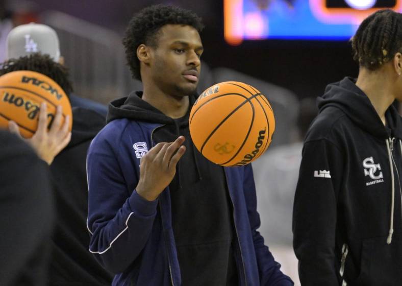 Jan 27, 2023; Los Angeles, CA, USA;  Sierra Canyon Trailblazers point guard Bronny James (0) looks on during warm up for the Battle of the Valley against the Notre Dame Knights played at Pauley Pavilion. James did not play because of a knee injury. Mandatory Credit: Jayne Kamin-Oncea-USA TODAY Sports