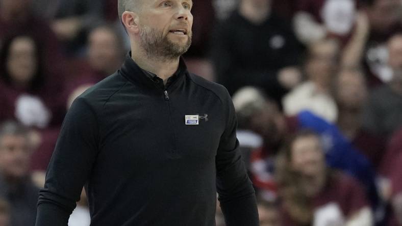 Jan 28, 2023; Charleston, South Carolina, USA; Charleston Cougars head coach Pat Kelsey watches the action in the second half against the Hofstra Pride at TD Arena. Mandatory Credit: David Yeazell-USA TODAY Sports