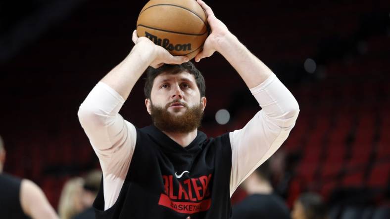 Jan 28, 2023; Portland, Oregon, USA; Portland Trail Blazers center Jusuf Nurkic (27) warms up prior to a game against the Toronto Raptors at Moda Center. Mandatory Credit: Soobum Im-USA TODAY Sports