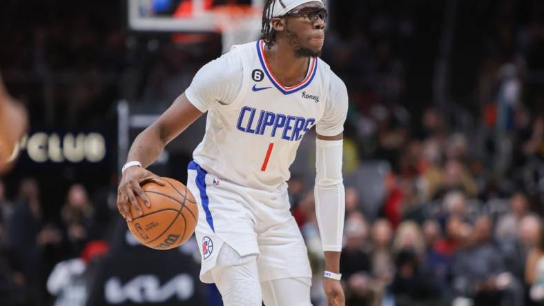 Jan 28, 2023; Atlanta, Georgia, USA; LA Clippers guard Reggie Jackson (1) dribbles against the Atlanta Hawks in the second half at State Farm Arena. Mandatory Credit: Brett Davis-USA TODAY Sports