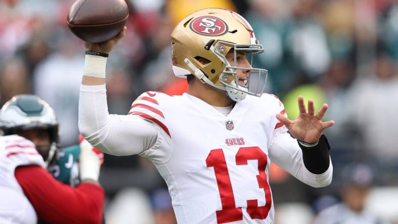 Jan 29, 2023; Philadelphia, Pennsylvania, USA; San Francisco 49ers quarterback Brock Purdy (13) throws a pass against the Philadelphia Eagles during the first quarter in the NFC Championship game at Lincoln Financial Field. Mandatory Credit: Bill Streicher-USA TODAY Sports