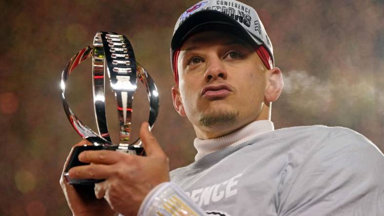 Jan 29, 2023; Kansas City, Missouri, USA; Kansas City Chiefs quarterback Patrick Mahomes (15) celebrates after winning the AFC Championship game against the Cincinnati Bengals at GEHA Field at Arrowhead Stadium. Mandatory Credit: Jay Biggerstaff-USA TODAY Sports