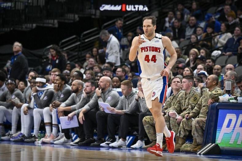 Jan 30, 2023; Dallas, Texas, USA; Detroit Pistons forward Bojan Bogdanovic (44) points to his teammates after he makes a three point shot against the Dallas Mavericks during the second quarter at the American Airlines Center. Mandatory Credit: Jerome Miron-USA TODAY Sports