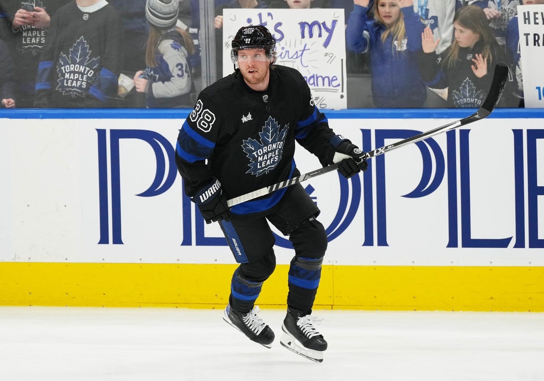 Jan 27, 2023; Toronto, Ontario, CAN; Toronto Maple Leafs defenseman Rasmus Sandin (38) skates against the Ottawa Senators during the warmup at Scotiabank Arena. Mandatory Credit: Nick Turchiaro-USA TODAY Sports