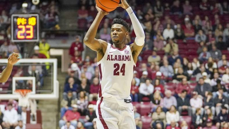 Jan 31, 2023; Tuscaloosa, Alabama, USA; Alabama Crimson Tide forward Brandon Miller (24) shoots against the Vanderbilt Commodores during the second half at Coleman Coliseum. Mandatory Credit: Marvin Gentry-USA TODAY Sports