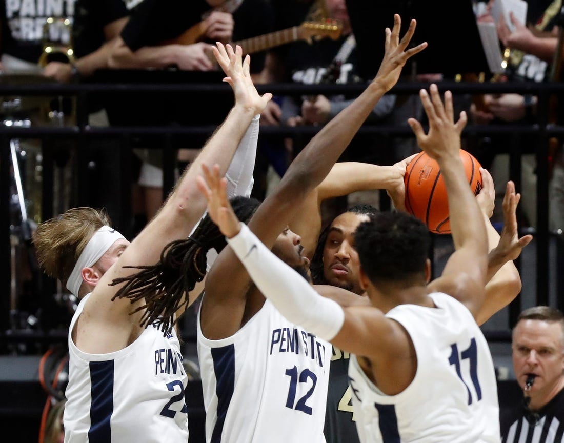 Penn State Nittany Lions forward Michael Henn (24), Penn State Nittany Lions guard Evan Mahaffey (12) and Penn State Nittany Lions guard Camren Wynter (11) defend Purdue Boilermakers forward Trey Kaufman-Renn (4) during the NCAA men   s basketball game, Wednesday, Feb. 1, 2023, at Mackey Arena in West Lafayette, Ind. Purdue won 80-60.

Purpennmbb020123 Am17331