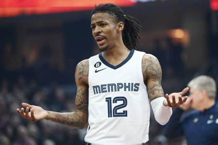 Feb 2, 2023; Cleveland, Ohio, USA; Memphis Grizzlies guard Ja Morant (12) reacts to a call during the first half against the Cleveland Cavaliers at Rocket Mortgage FieldHouse. Mandatory Credit: Ken Blaze-USA TODAY Sports