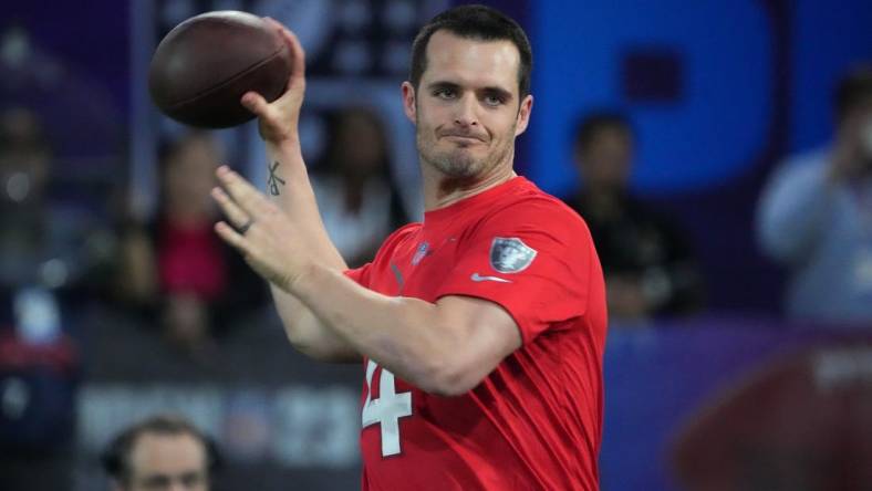 Feb 2, 2023; Henderson, NV, USA; Las Vegas Raiders quarterback Derek Carr (4) throws the ball during the Pro Bowl Skills competition at the Intermountain Healthcare Performance Facility. Mandatory Credit: Kirby Lee-USA TODAY Sports