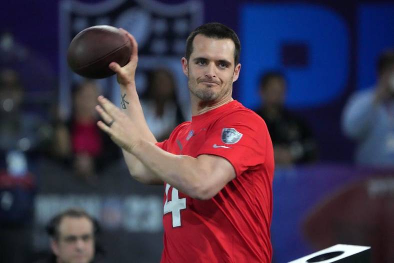 Feb 2, 2023; Henderson, NV, USA; Las Vegas Raiders quarterback Derek Carr (4) throws the ball during the Pro Bowl Skills competition at the Intermountain Healthcare Performance Facility. Mandatory Credit: Kirby Lee-USA TODAY Sports