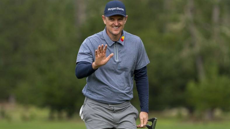 February 3, 2023; Pebble Beach, California, USA; Justin Rose acknowledges the crowd after his putt on the ninth hole during the second round of the AT&T Pebble Beach Pro-Am golf tournament at Spyglass Hill Golf Course. Mandatory Credit: Kyle Terada-USA TODAY Sports