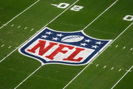 Feb 3, 2023; Las Vegas, NV, USA; A NFL Shield logo on the flag football field at Allegiant Stadium. Mandatory Credit: Kirby Lee-USA TODAY Sports