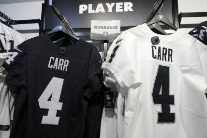 Feb 3, 2023; Las Vegas, NV, USA; A clearance sale on the jerseys of Las Vegas Raiders quarterback Derek Carr (4) at the Raider Image team store at Allegiant Stadium. Mandatory Credit: Kirby Lee-USA TODAY Sports
