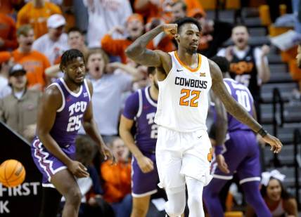 Oklahoma State's Kalib Boone (22) celebrates after a basket in the first half during the men's college basketball game between the Oklahoma State Cowboys and TCU Horned Frog at Gallagher-IBA Arena in Stillwater, Okla., Saturday, Feb.4, 2023.

Osu Mbb V Tcu