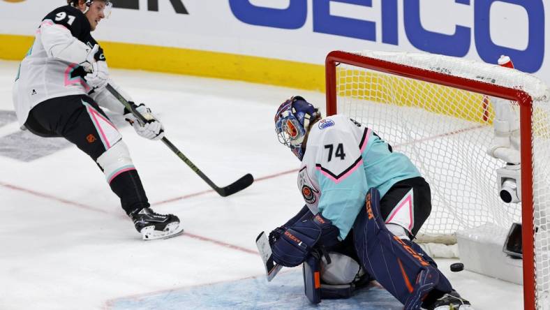 Feb 4, 2023; Sunrise, Florida, USA; Central Division forward Vladimir Tarasenko (91) of the St. Louis Blues scores a goal against Central Division goaltender Juuse Saros (74) of the Nashville Predators during the second period of a semifinal game during the 2023 NHL All-Star Game at FLA Live Arena. Mandatory Credit: Sam Navarro-USA TODAY Sports